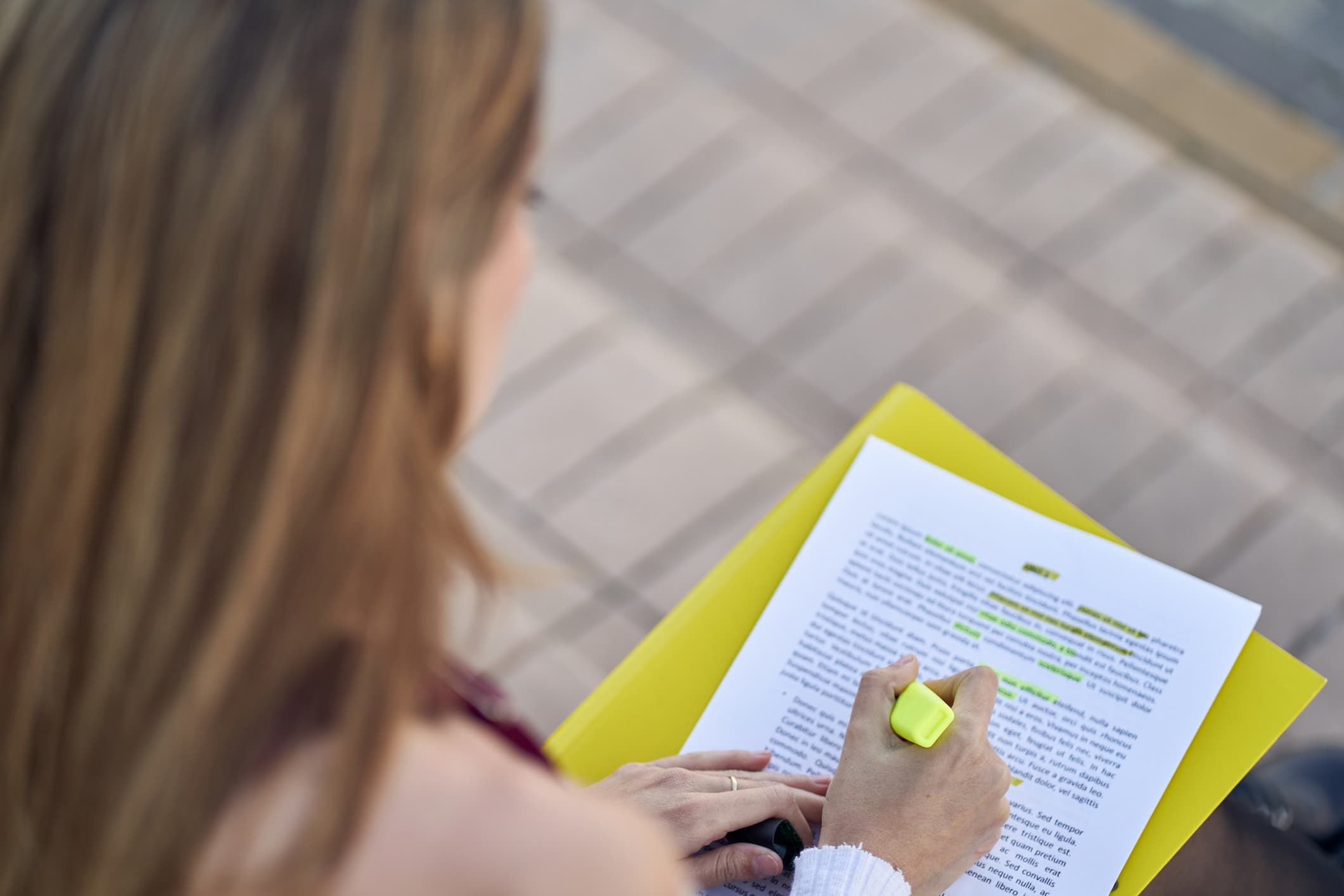 A woman reviewing documents for the Spanish NIE number