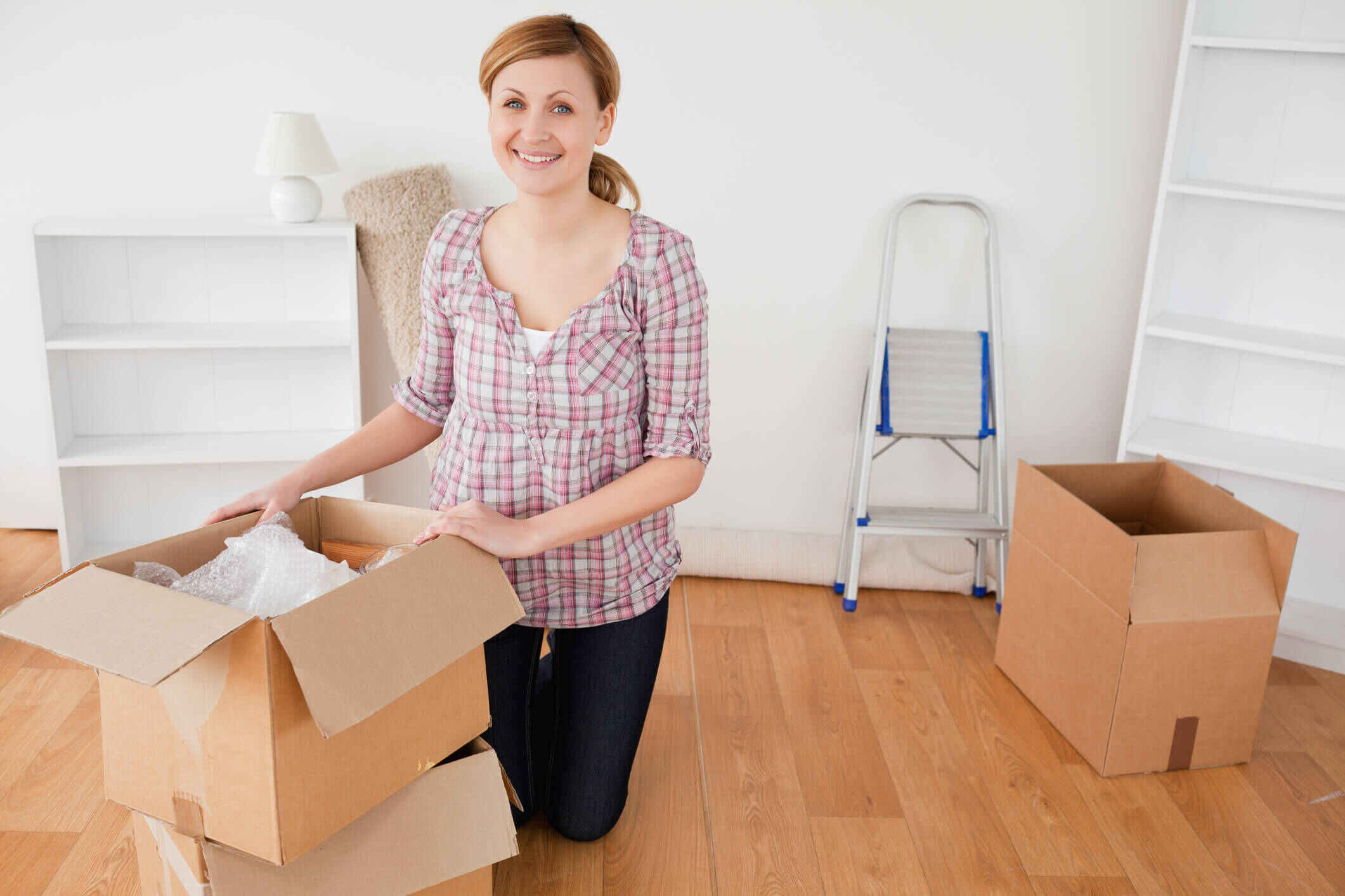 Non-resident landlord packing up her home before renting it out